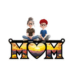 Personalized Mom suncatcher with a stained glass scene inside the word MOM and named family figures on top